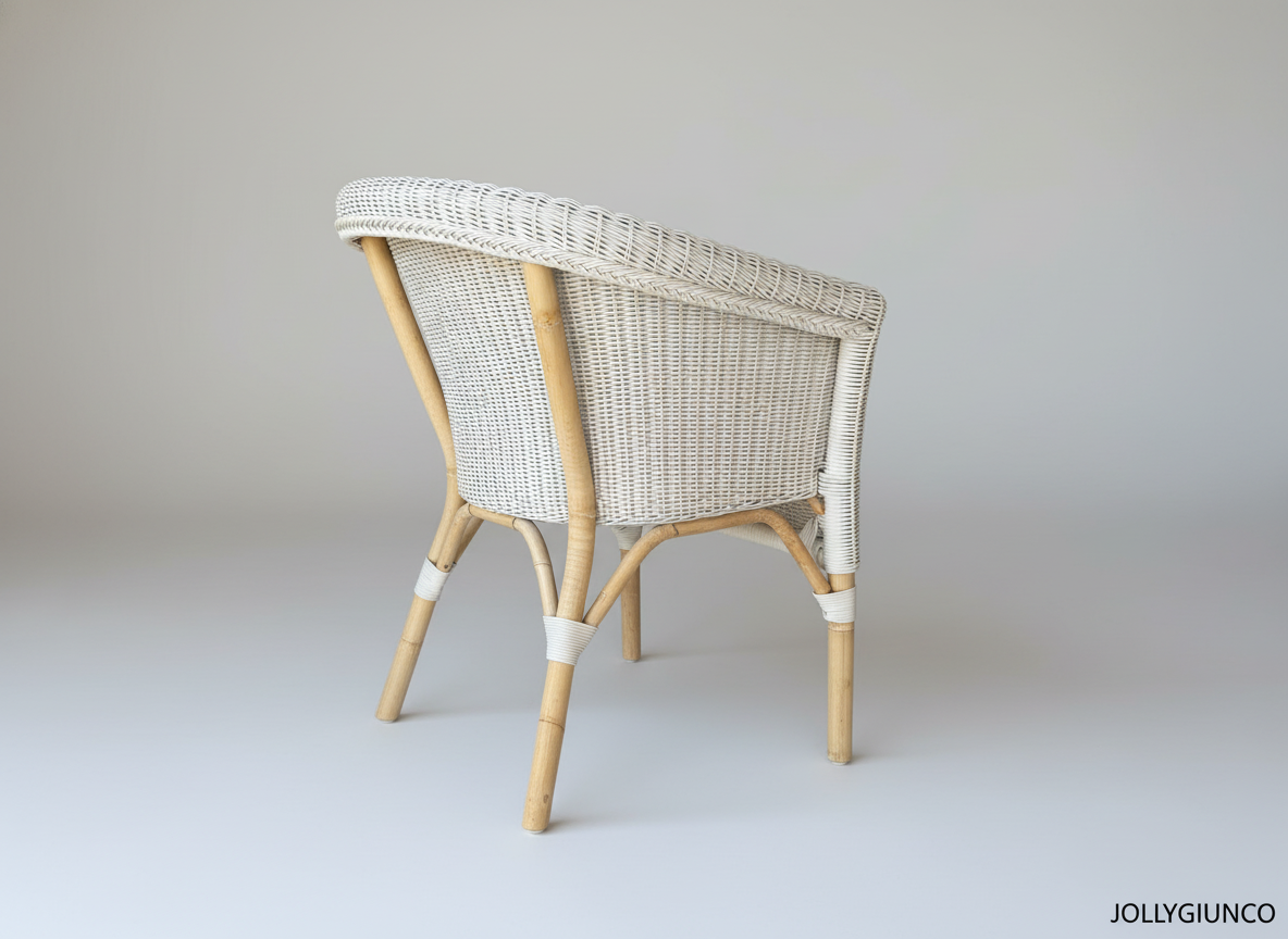 Poltroncina Malta Pozzetto polyrattan 2 jollygiuncoeu white wicker chair with light wood legs in a minimalist studio setting