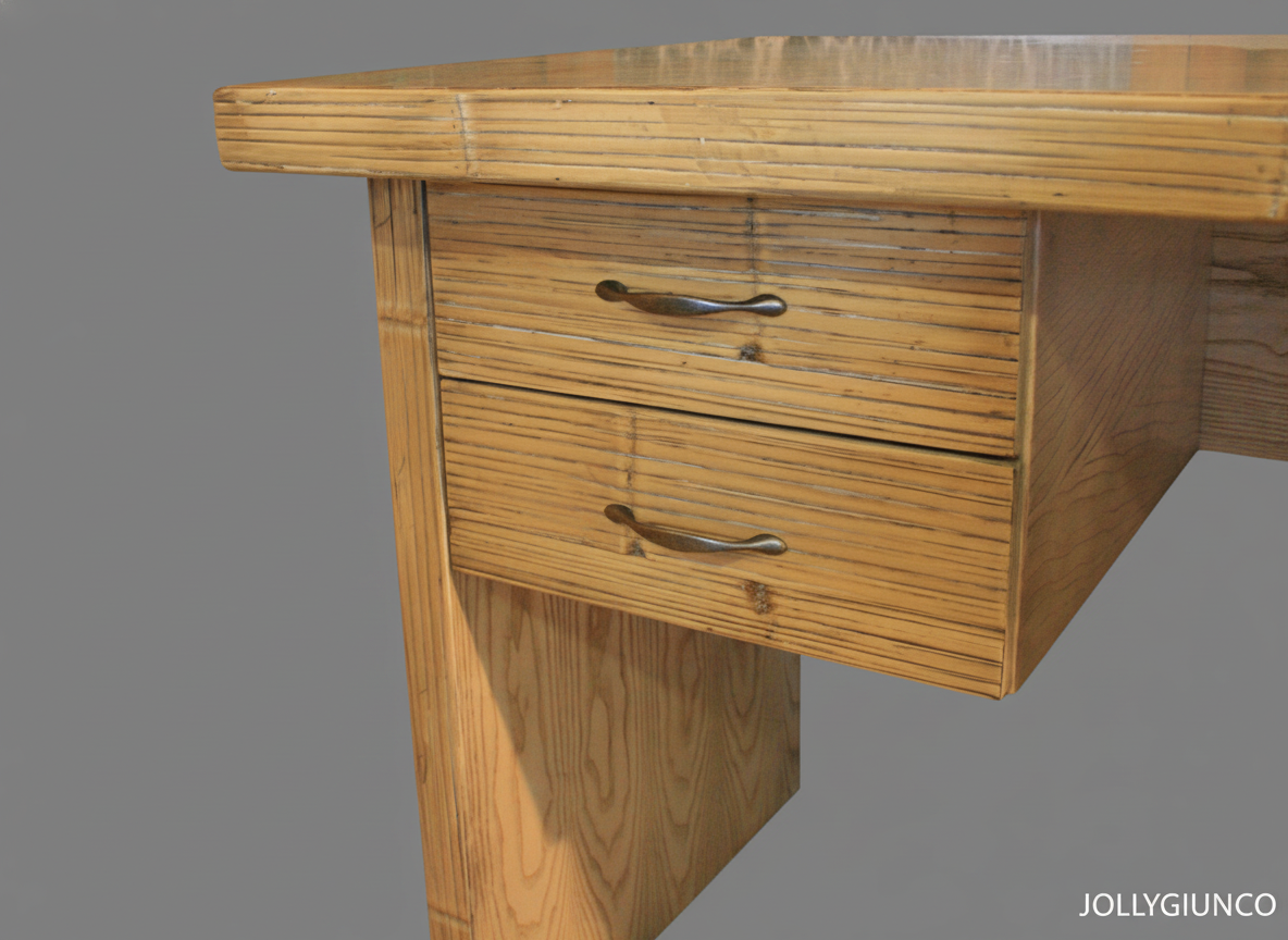 Scrivania Yuri in Crash Bamboo 1 jollygiuncoeu wooden desk with two small drawers and metal handles viewed from the side against a gray background