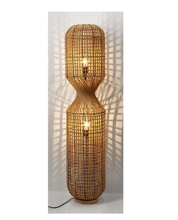 PIANTANA MALABO NATURALE H1351 jollygiuncoeu tall wicker floor lamp with a twisted midsection lit casting lattice shadows on the wall