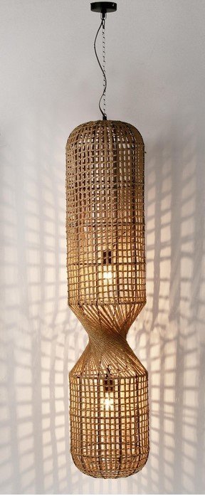 LAMPADARIO MALABO NATURALE H1322 jollygiuncoeu woven rattan pendant light with two bulb sections forming an hourglass shape hanging from the ceiling and casting lattice shadows on the wall