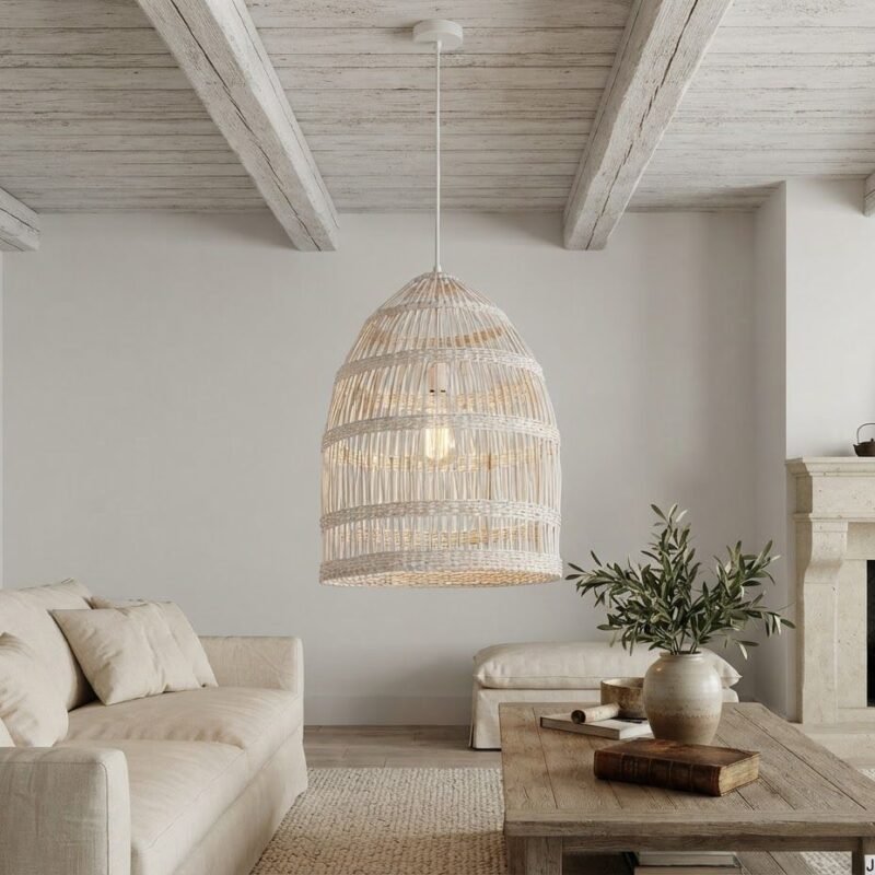 Neutral-toned living room with a large woven pendant light, beige sofa, and a wooden coffee table by the fireplace.
