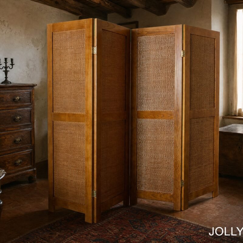 Vintage room with three tall wooden folding screens woven with cane panels, flanked by a dark wooden dresser and window. Type: interior shot.
