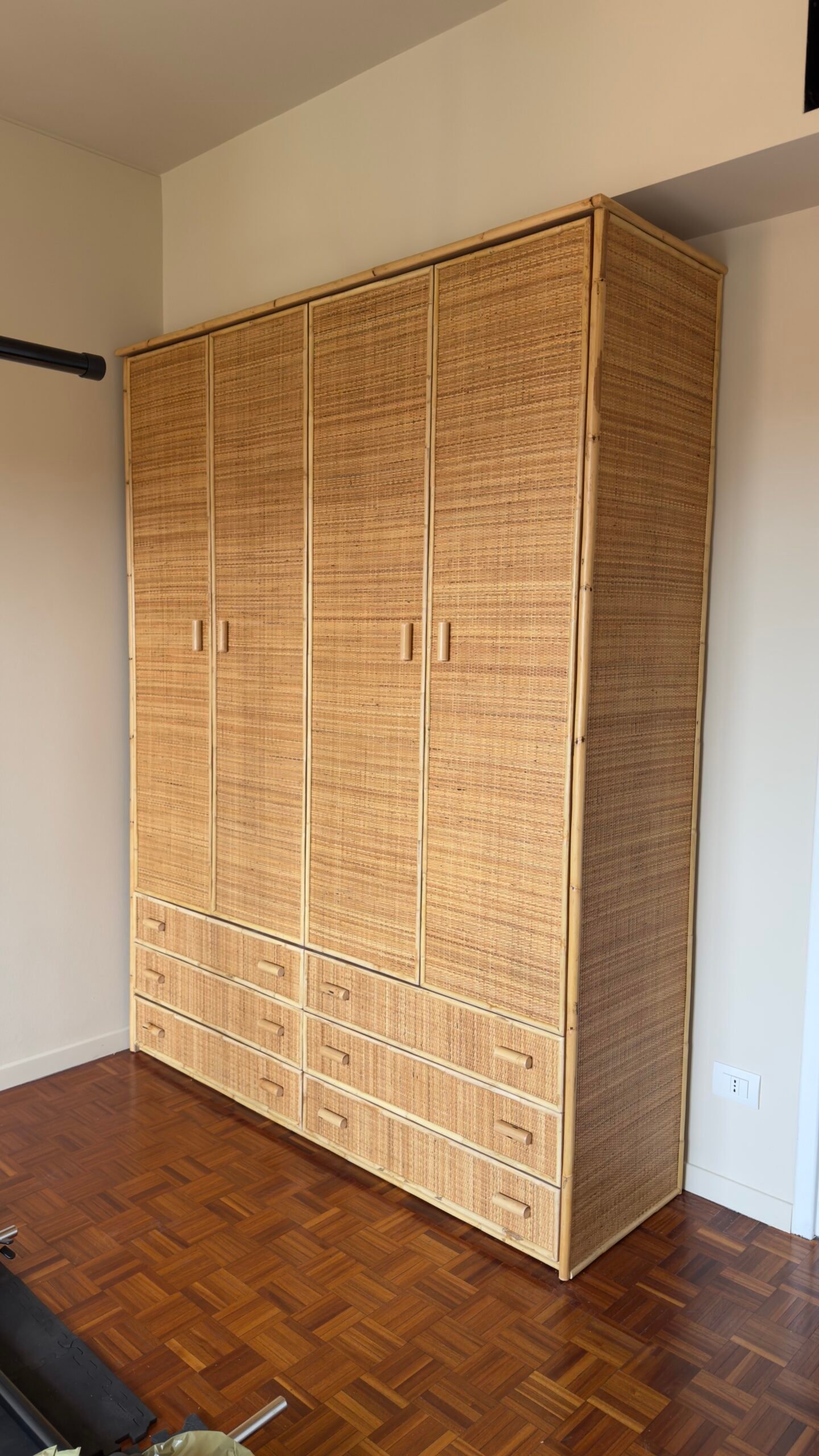 IMG2786 jollygiuncoeu tall woven rattan storage cabinet with multiple doors and bottom drawers in a room with parquet floor