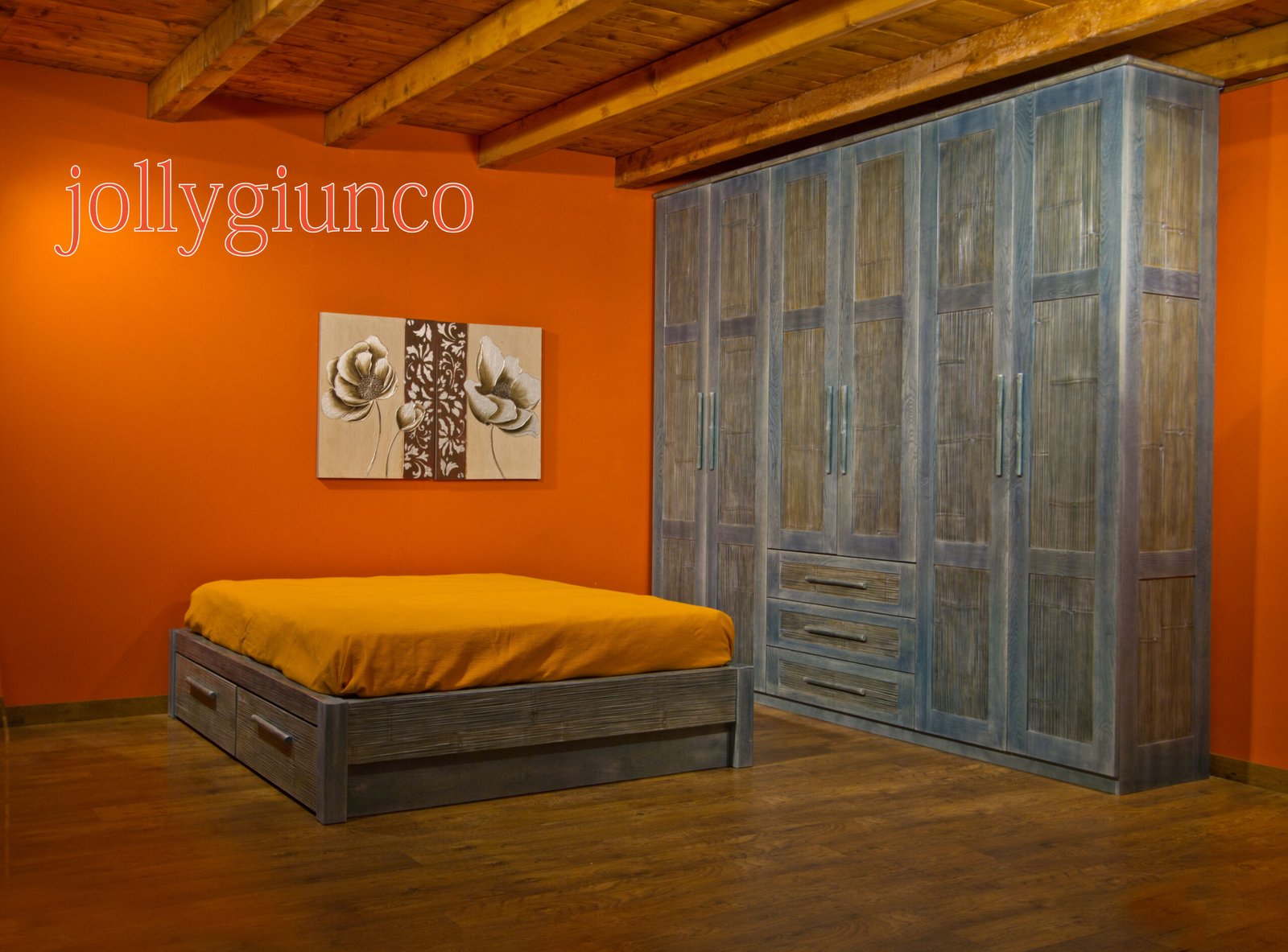 jollygiuncoletti17g jollygiuncoeu orange walled bedroom with a blue distressed wood wardrobe exposed ceiling beams and an orange duvet covered bed