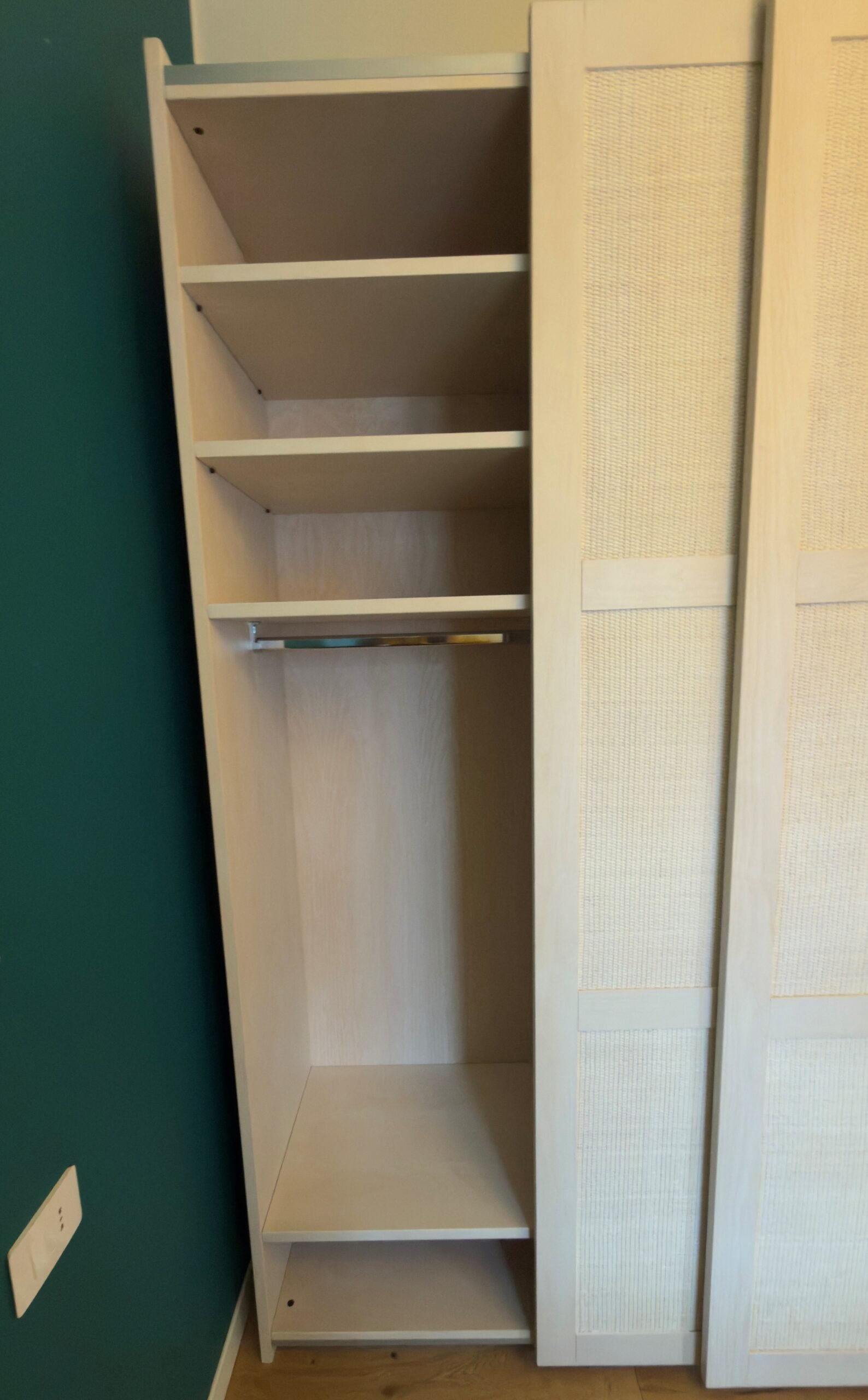 Armadio Erice a 3 Ante Scorrevoli con cassettiera3 2 jollygiuncoeu tall light wood cabinet with open shelves on the left and woven panel doors on the right empty shelves visible